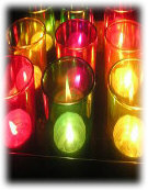 coloured gel candles in a row